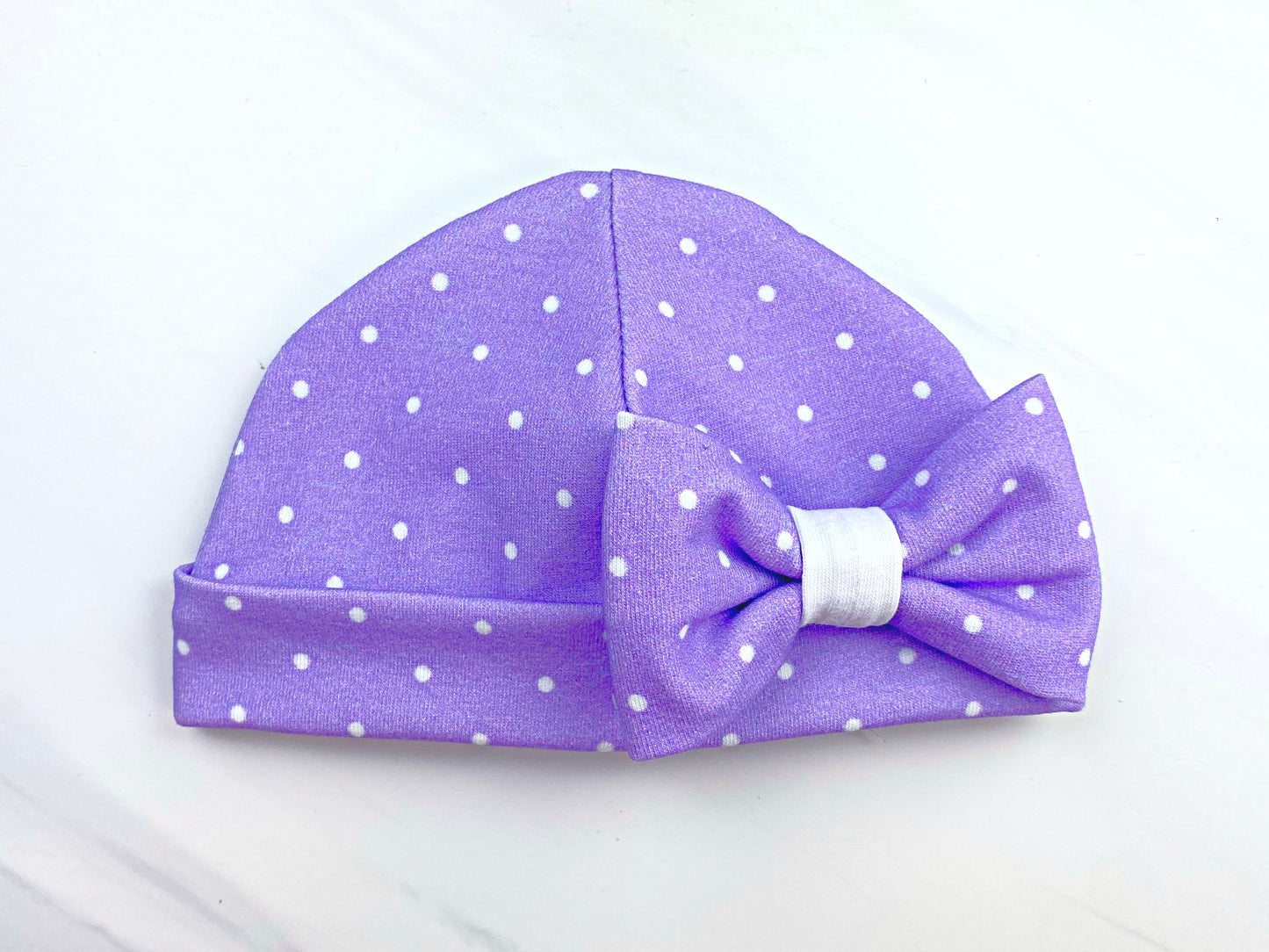 how to sew a newborn baby infant hat with a bow, hospital hat, boy or girl, easy knit sewing patterns for baby, serger sewing, aloha sewing company tutorials