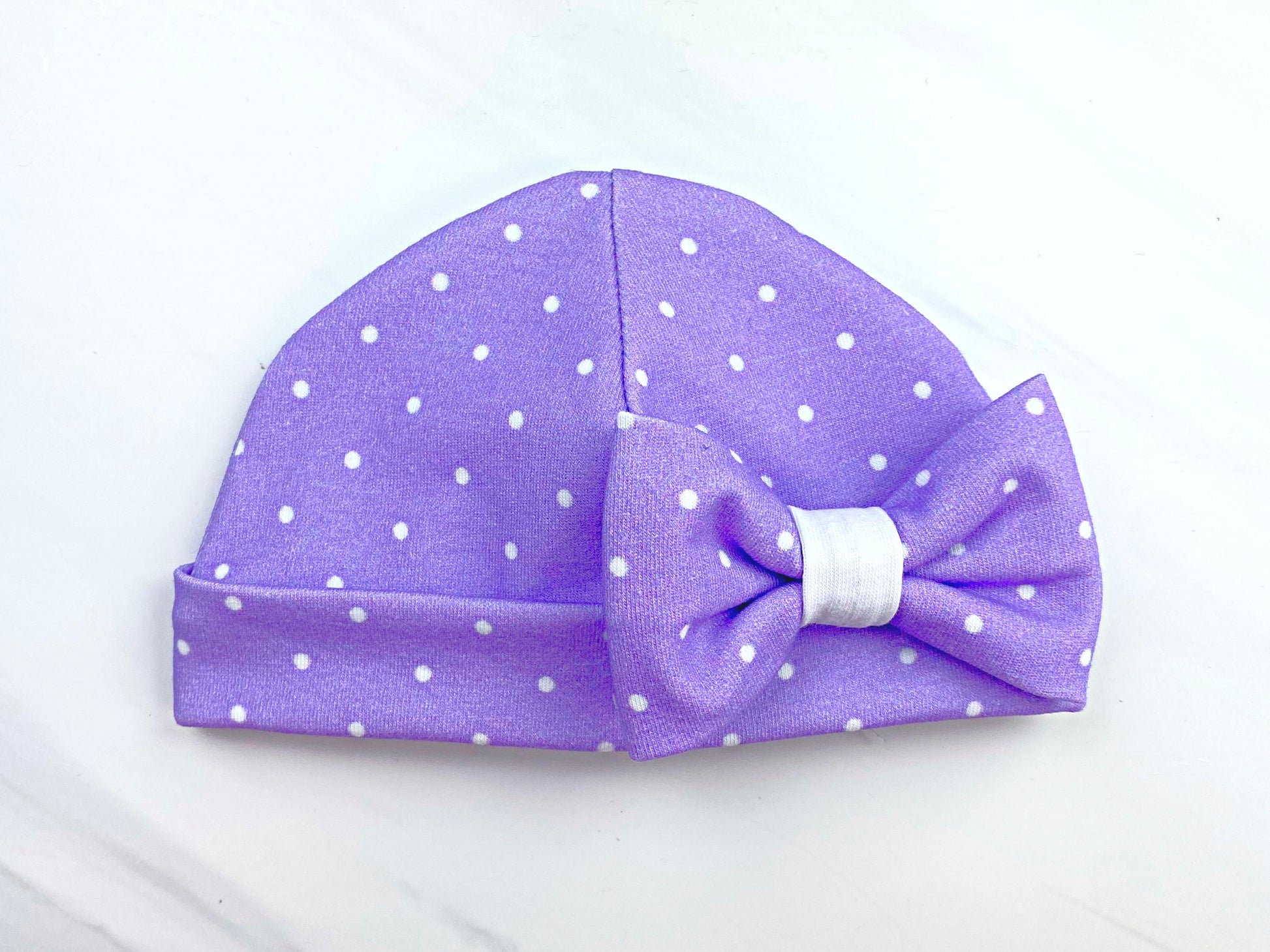 how to sew a newborn baby infant hat with a bow, hospital hat, boy or girl, easy knit sewing patterns for baby, serger sewing, aloha sewing company tutorials