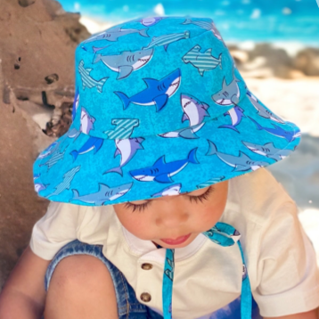 Easy bucket sun hat sewing pattern, diy babies bucket hat with straps, chin ties, toddler bucket hat, how to sew a bucket hat for girls or boys by aloha sewing company. Easy DIY sewing tutorial video and printable pattern.