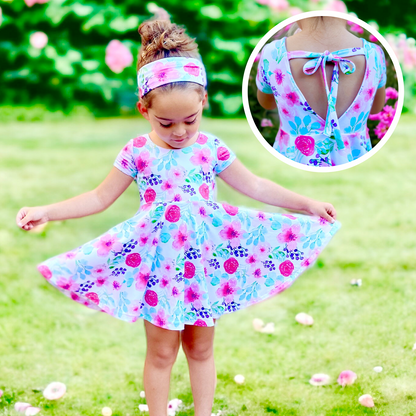 baby and girls tie back twirl dress sewing pattern for beginners with an open back that ties. Sew with a regular sewing machine or a serger!