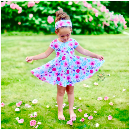 baby and girls tie back twirl dress sewing pattern for beginners with an open back that ties. Sew with a regular sewing machine or a serger! aloha sewing company