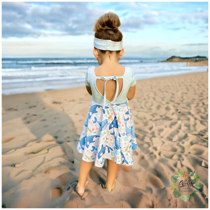 baby and girls tie back twirl dress sewing pattern for beginners with an open back that ties. Sew with a regular sewing machine or a serger! aloha sewing company