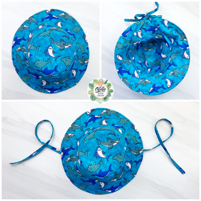 Easy bucket sun hat sewing pattern, diy babies bucket hat with straps, chin ties, toddler bucket hat, how to sew a bucket hat for girls or boys by aloha sewing company. Easy DIY sewing tutorial video and printable pattern.