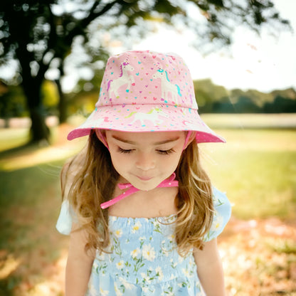 Easy bucket sun hat sewing pattern, diy babies bucket hat with straps, chin ties, toddler bucket hat, how to sew a bucket hat for girls or boys by aloha sewing company. Easy DIY sewing tutorial video and printable pattern.