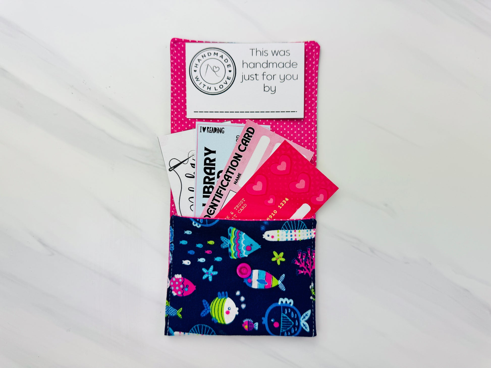 Fabric wallet with colorful pretend play cards peeking out – perfect printable accessory for kids’ imaginative play