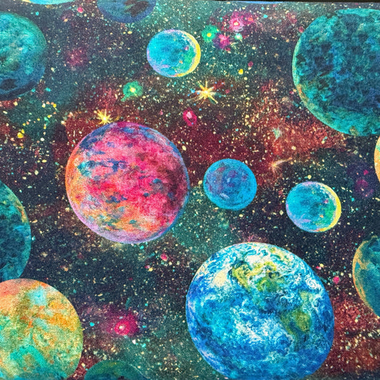 Colorful depiction of planets and stars on a dark background on 100 percent cotton fabric for sewing